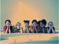 Environmental Outreach & Education Photo of children on their elbows