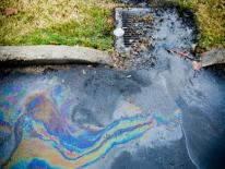 Photo of chemicals floating atop water